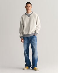 Reversed-collegepaita, jossa py&ouml;re&auml; p&auml;&auml;ntie