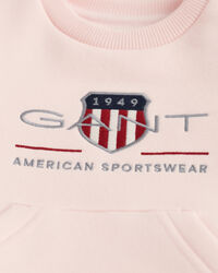 Baby-malliston Archive Shield ‑collegepaita, jossa py&ouml;re&auml; p&auml;&auml;ntie