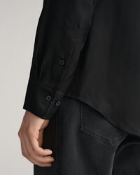 Slim fit ‑mitoitettu yksiv&auml;rinen rusettipaita