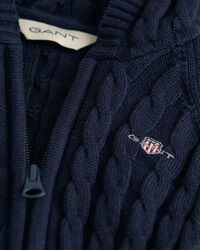 Baby-malliston puuvillainen Shield-palmikkoneulehaalari