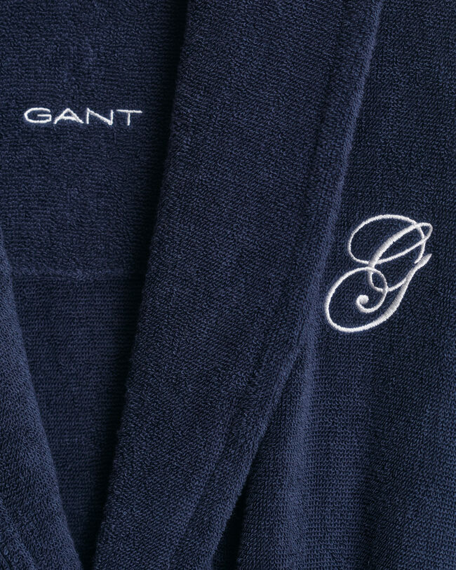 Kirjailtu kylpytakki