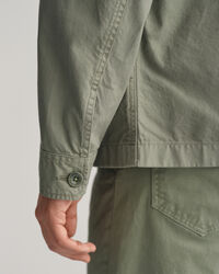 Valmiiksi ommeltuna v&auml;rj&auml;tty p&auml;&auml;llyspaita