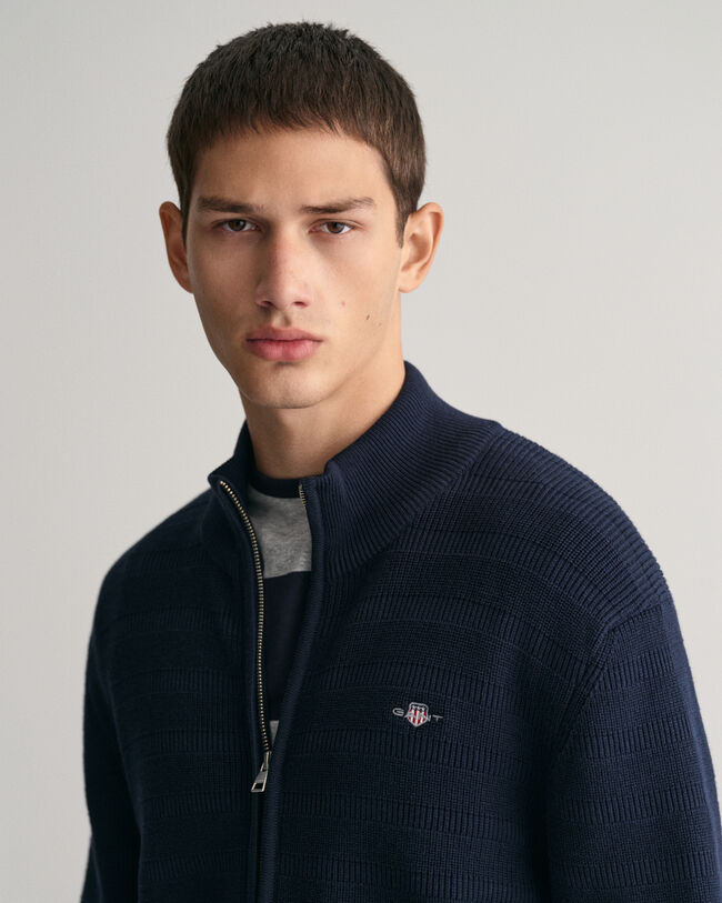 Kohopintainen raidallinen vetoketjullinen puuvillaneuletakki