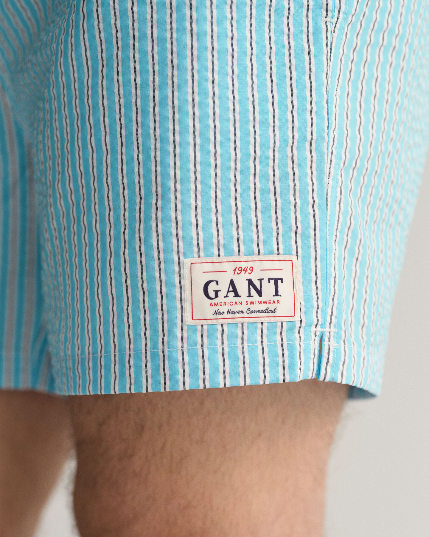 Classic&nbsp;fit ‑mitoitetut seersucker-pintaiset uimashortsit