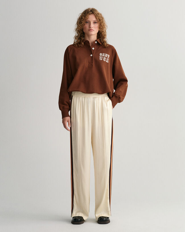 Relaxed fit -mitoitetut huolettomat raitahousut