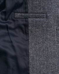 Lyhyt kalanruotokuvioinen villakangastakki