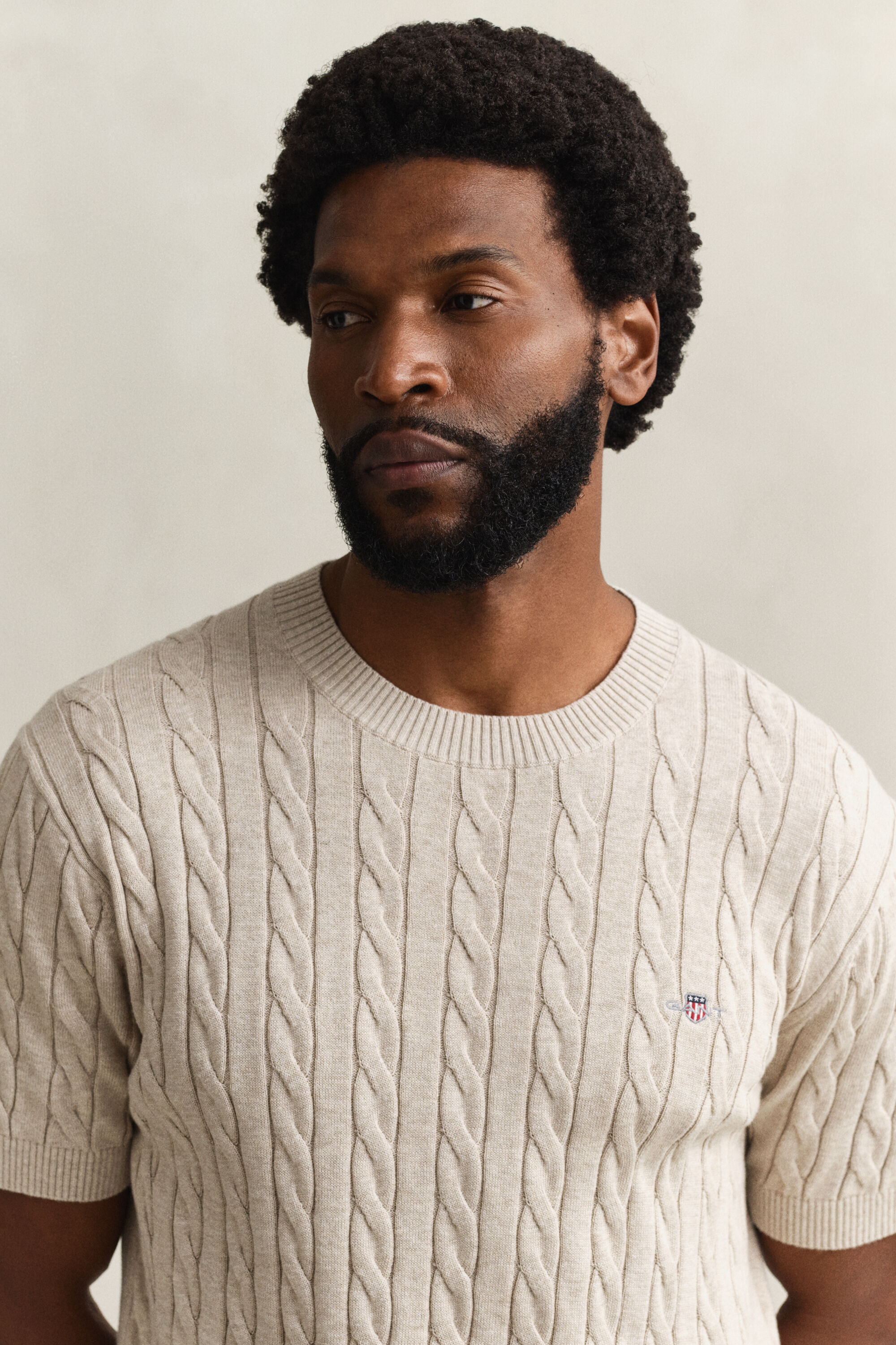 Lyhythihainen palmikkoneulepusero puuvillaa