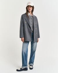 Käsin tikattu kansitakki