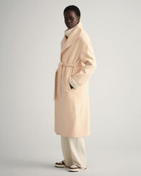 Käsin tikattu takki vyöllä