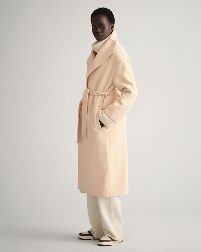 Käsin tikattu takki vyöllä