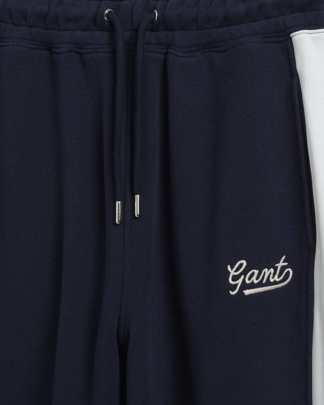 Moniväriset collegehousut