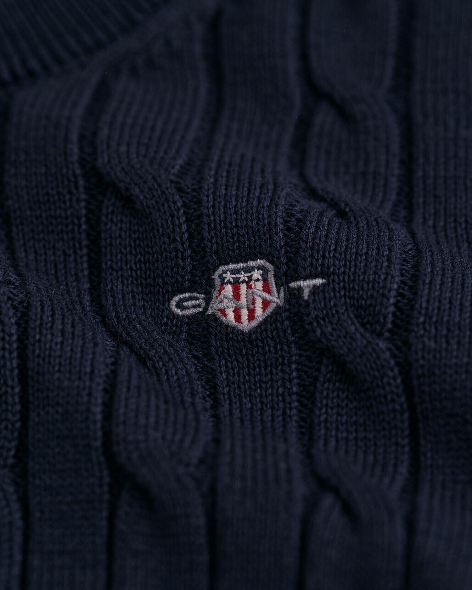 Kids-malliston puuvillainen Shield-palmikkoneulepusero, jossa pyöreä pääntie