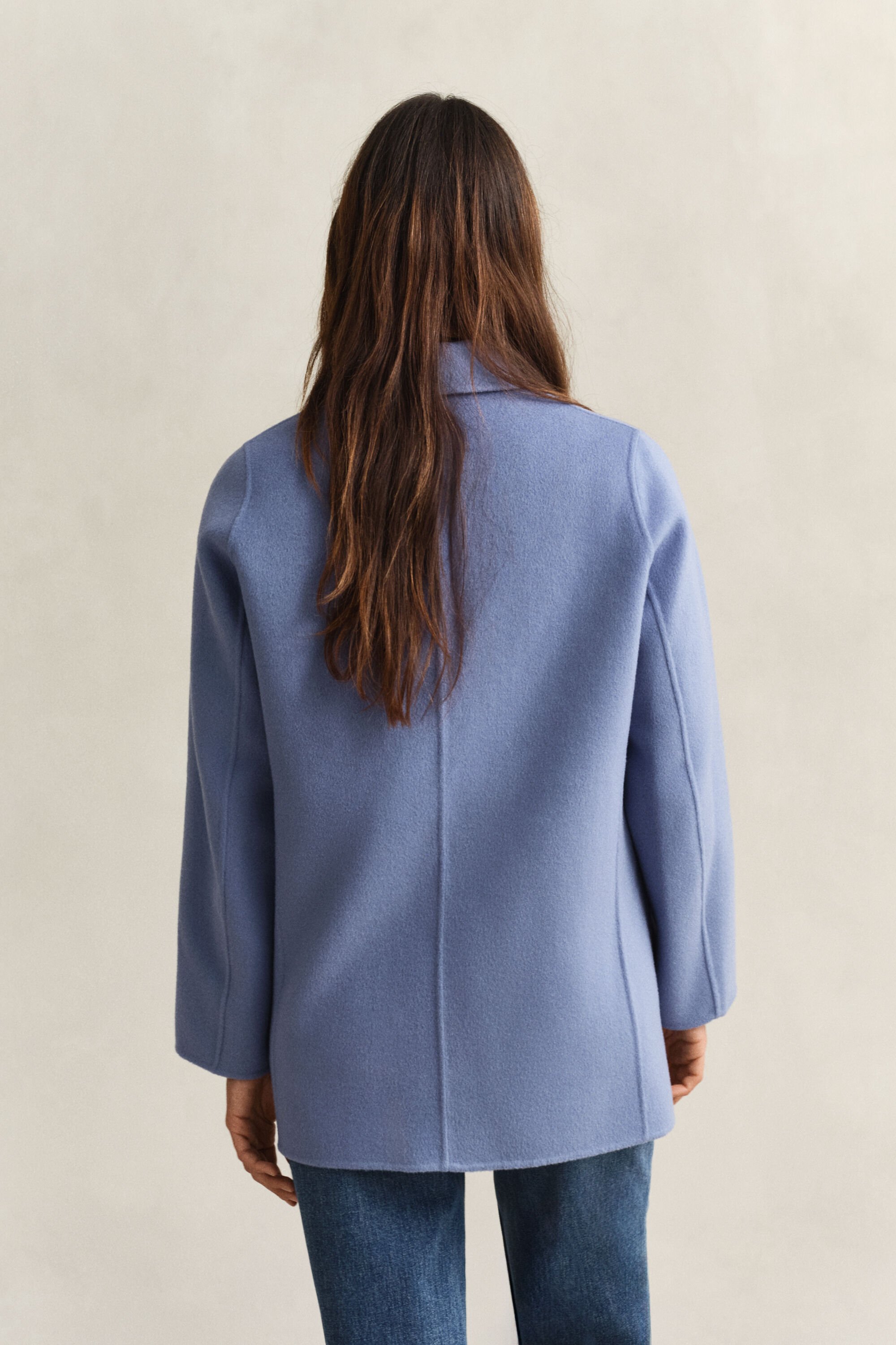 Käsin tikattu kansitakki