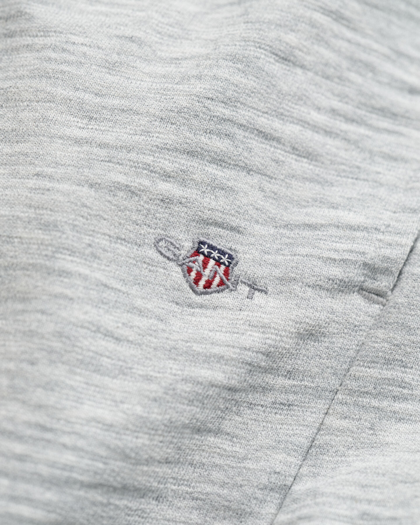 Teens-malliston slubipuuvillaiset Shield-collegeshortsit