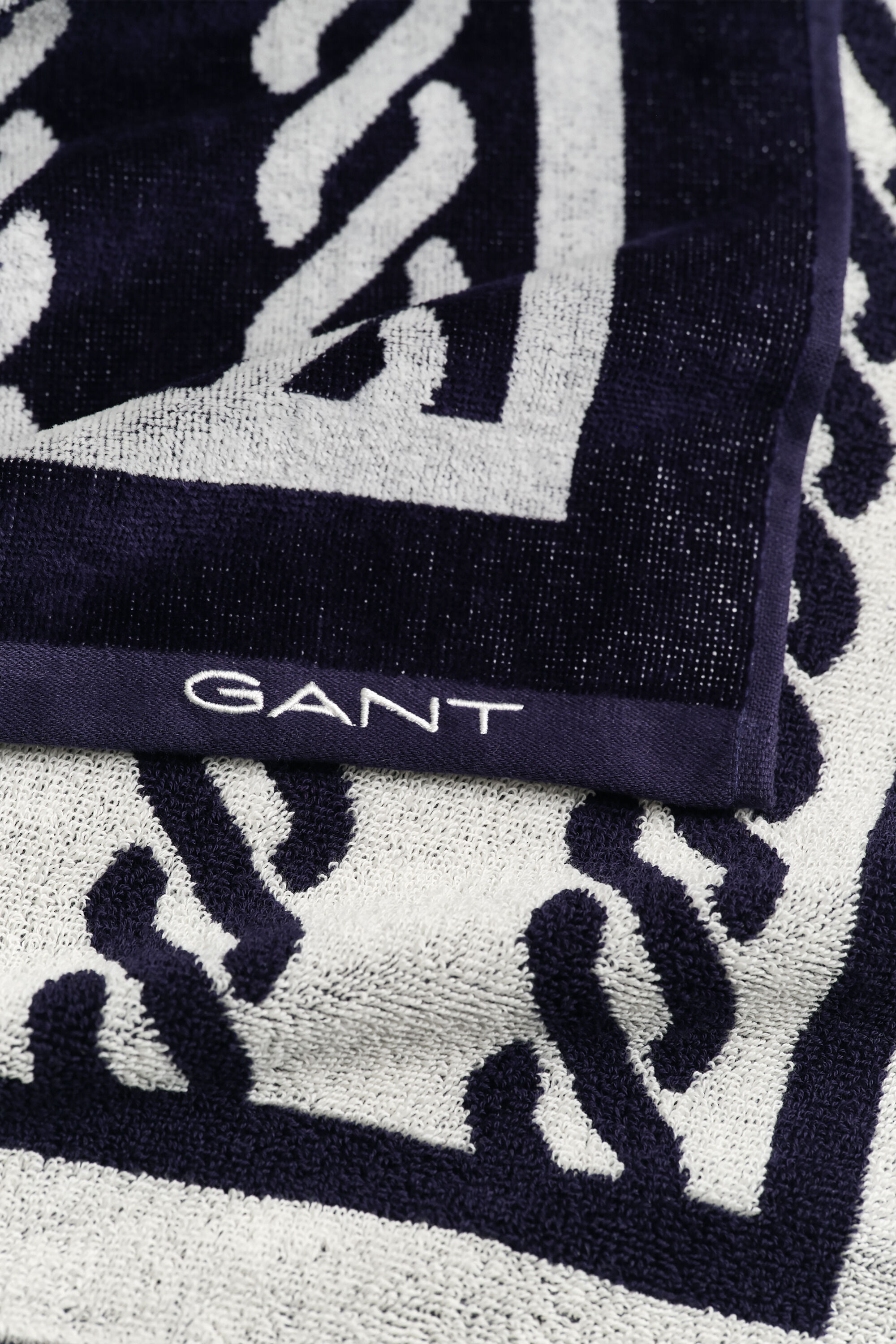 Köysiprinttikuviollinen rantapyyhe