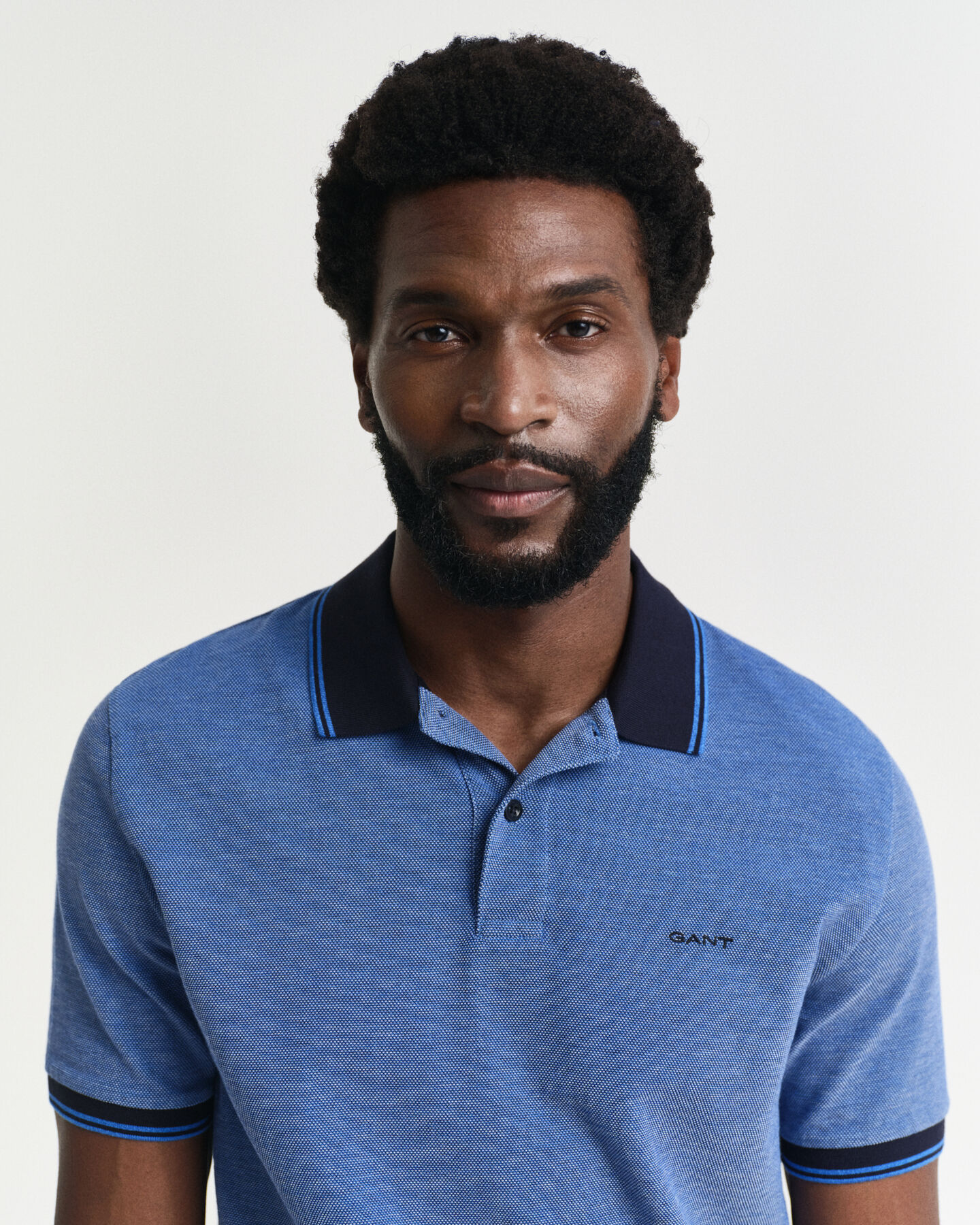 Nelivärinen oxford-kankainen pikeepaita