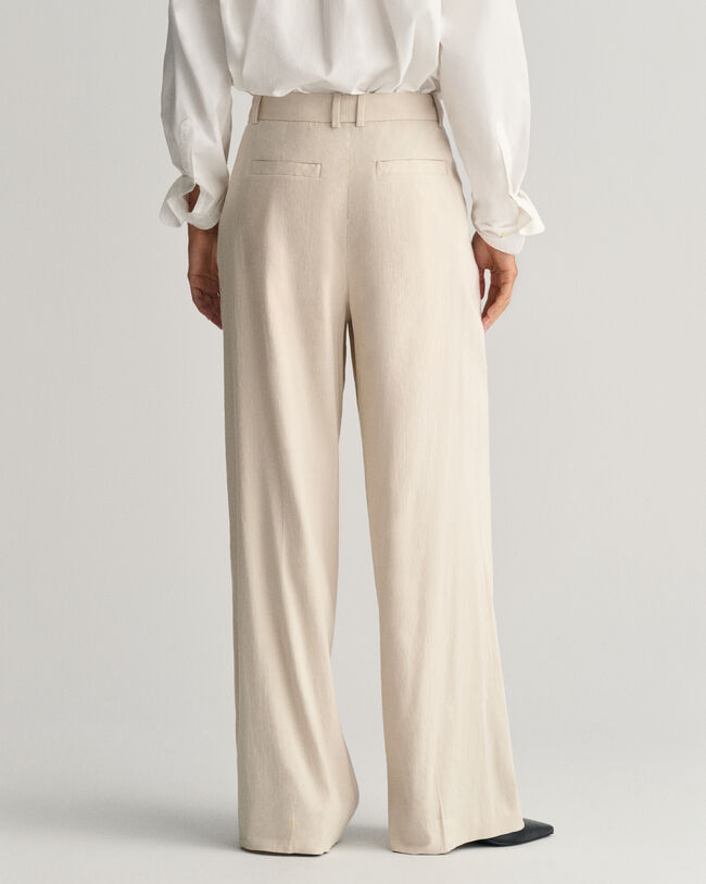 Relaxed fit ‑mitoitetut huolitellut joustopellavahousut