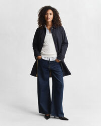 Joustava puuvillapalmikkoneule, jossa v‑pääntie