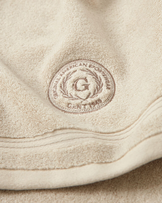 Crest‑pyyhe (70 cm x 140 cm)