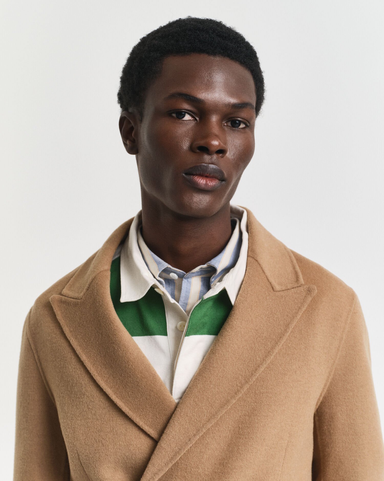 Käsin tikattu klubitakki