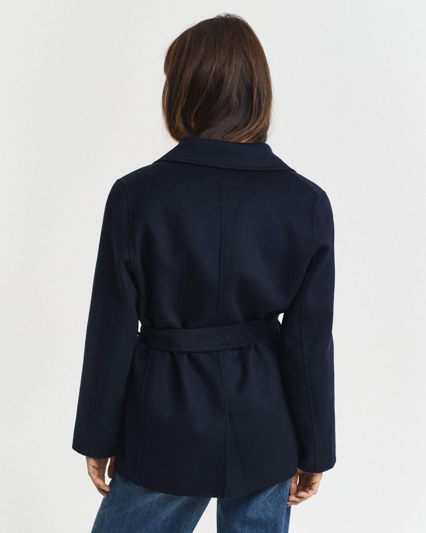 Käsin tikattu takki ja vyö