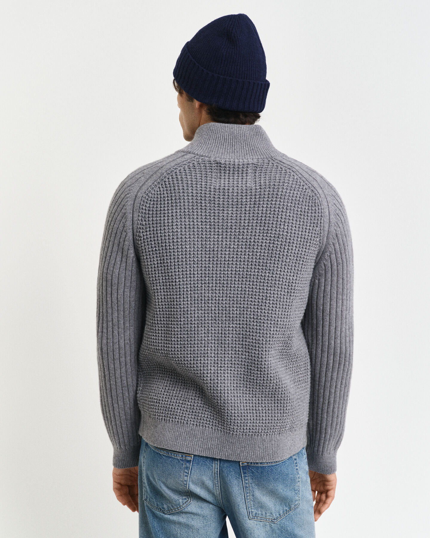 Kohopintainen vetoketjullinen neuletakki villasekoitetta