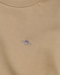 Shield-collegepaita, jossa py&ouml;re&auml; p&auml;&auml;ntie