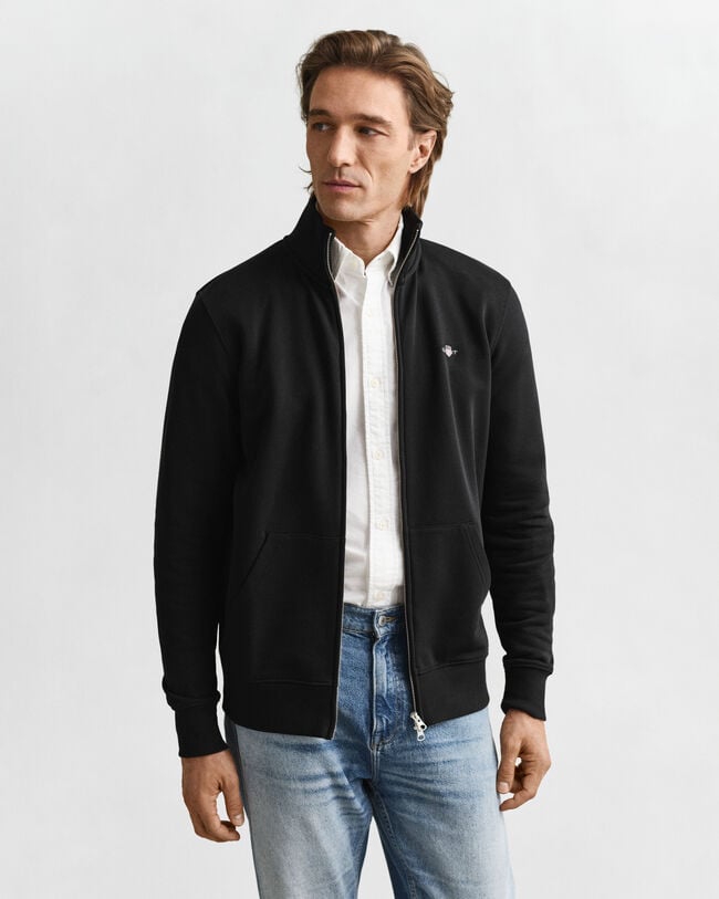 Vetoketjullinen Shield‑collegepaita