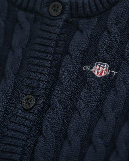 Baby-malliston puuvillainen Shield-palmikkoneuletakki