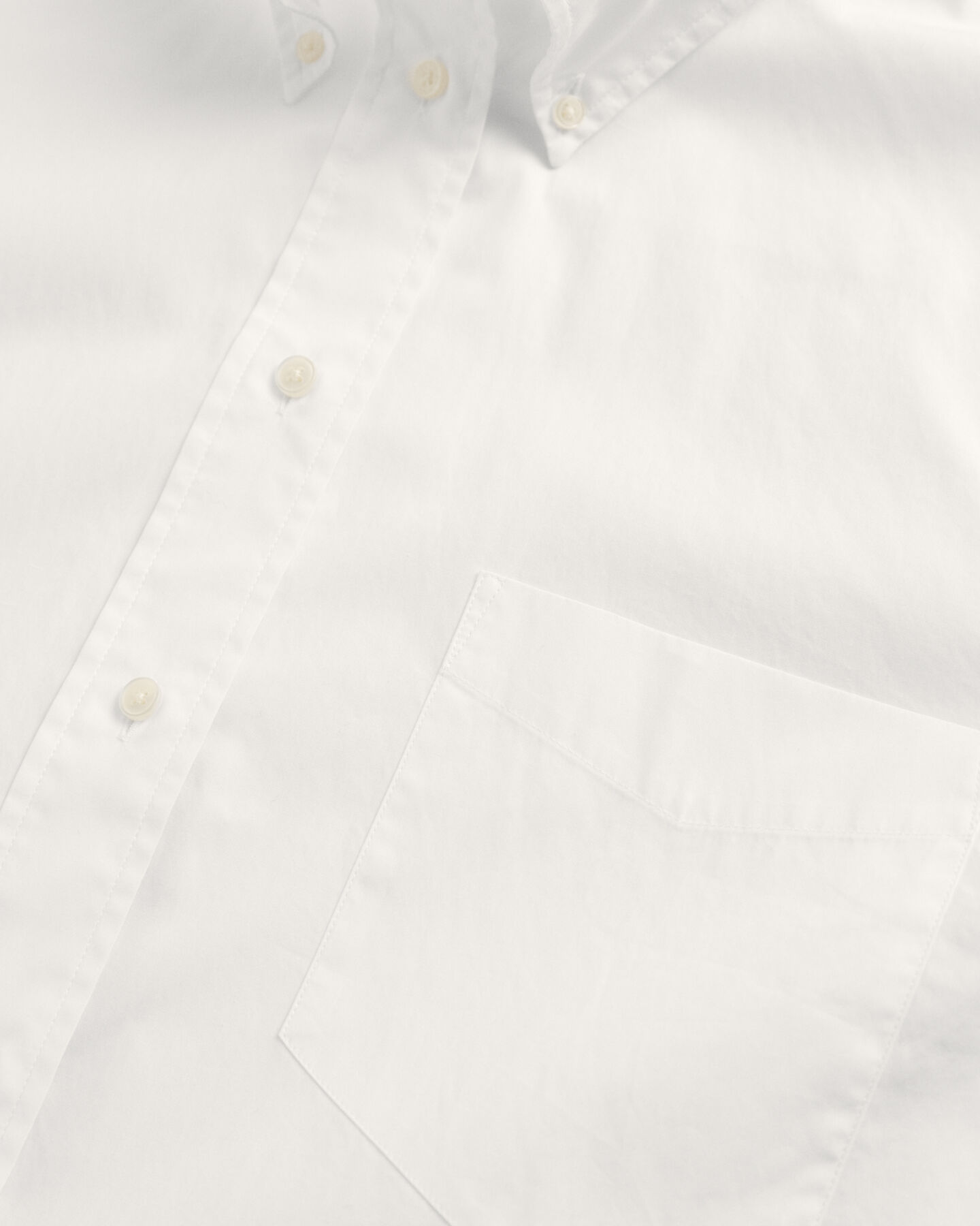 Relaxed fit ‑mitoitettu vajaamittainen paita