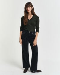 Joustava puuvillapalmikkoneule, jossa v‑pääntie