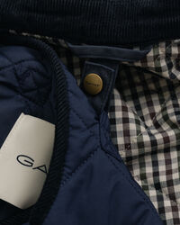 Kaksikerroksinen öljykangastakki