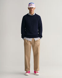 Puuvillainen palmikkoneulepusero, jossa py&ouml;re&auml; p&auml;&auml;ntie