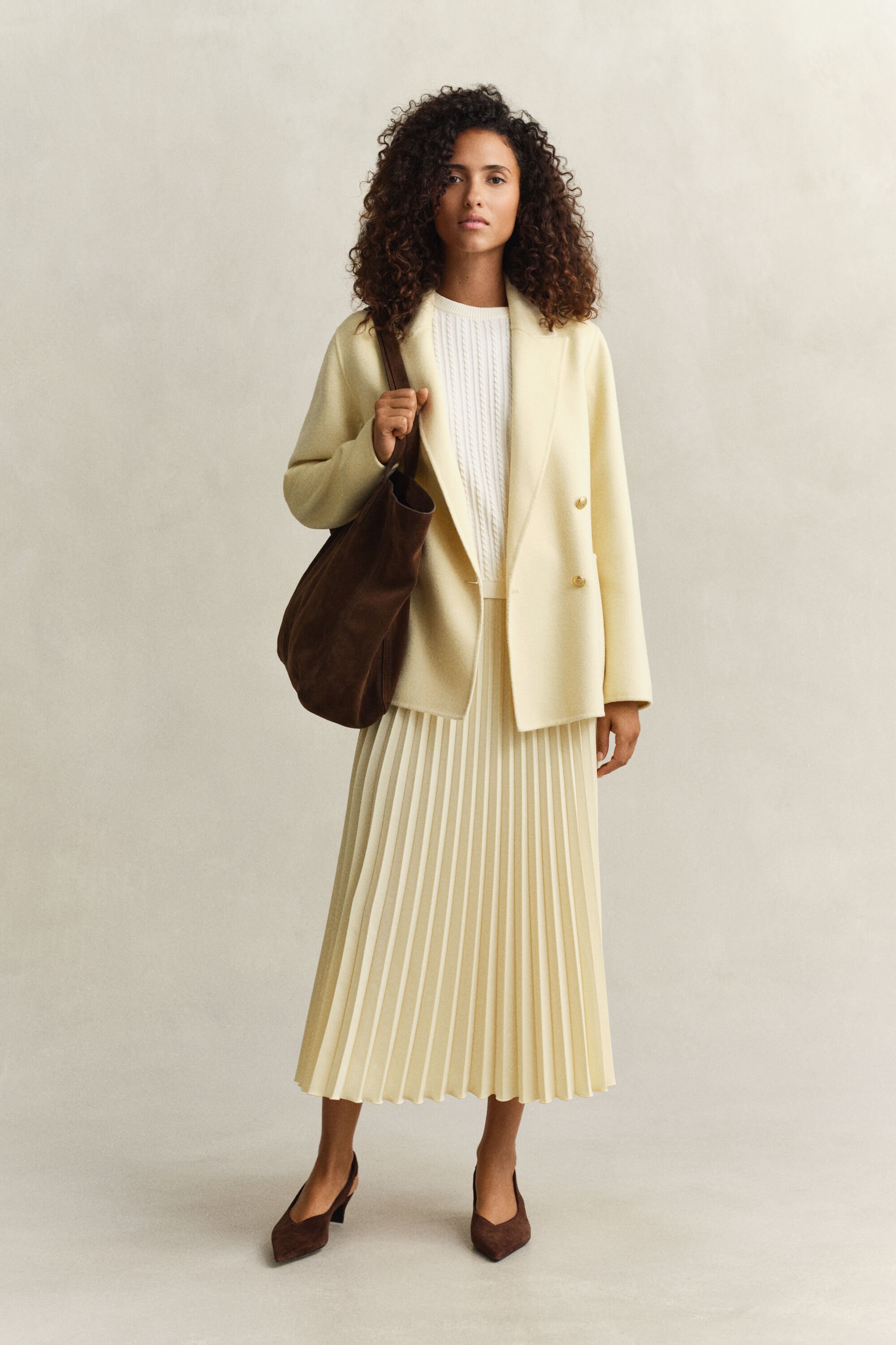 Käsin tikattu klubitakki