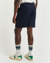 Kohopintaiset shortsit