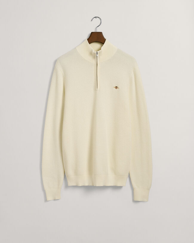 Kohopintainen puuvillaneulepusero, jossa vetoketjullinen p&auml;&auml;ntie