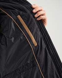 Kokopitkä untuvatakki