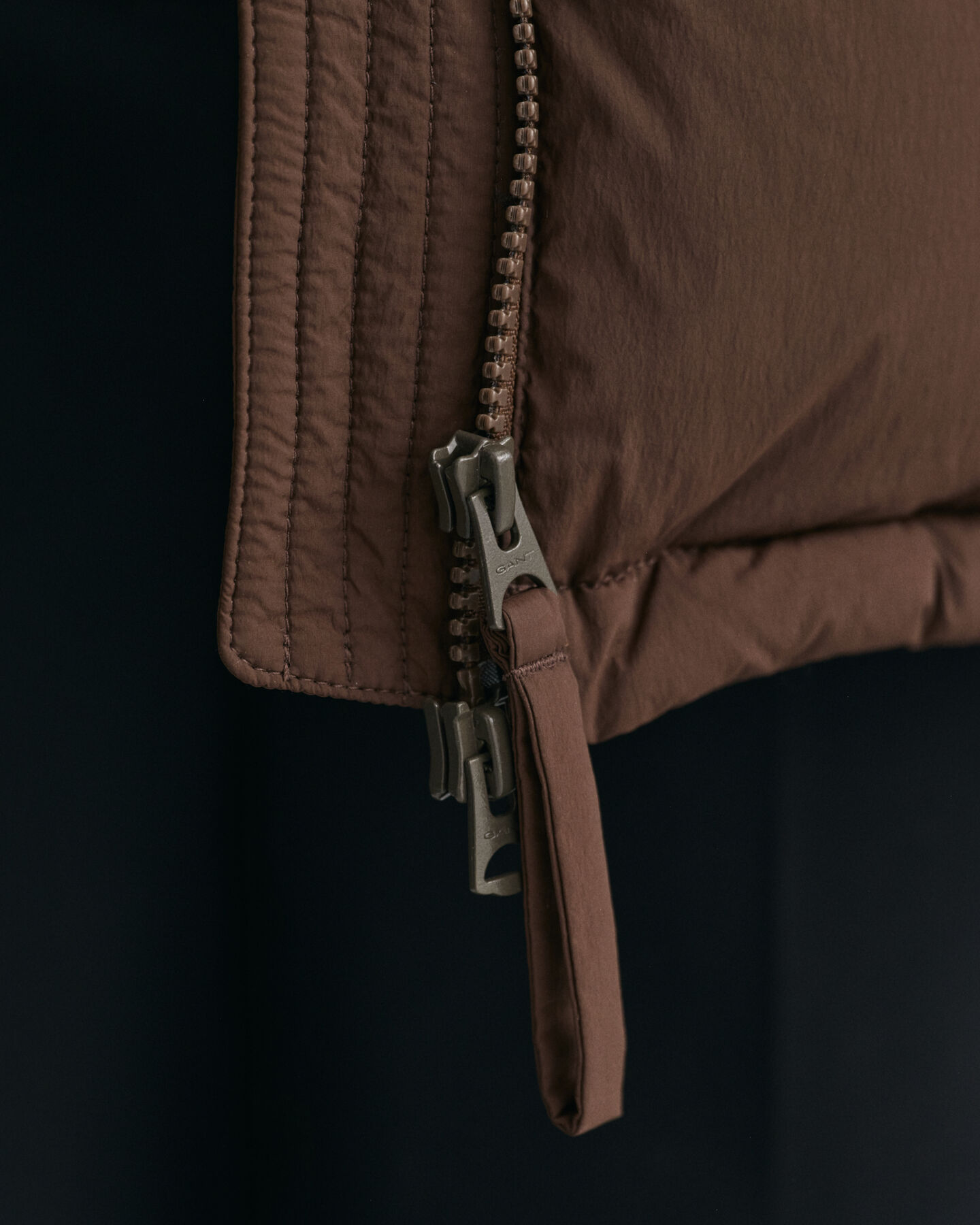 Puolipitkä untuvatakki