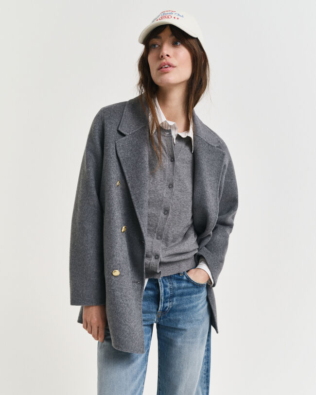 Käsin tikattu kansitakki