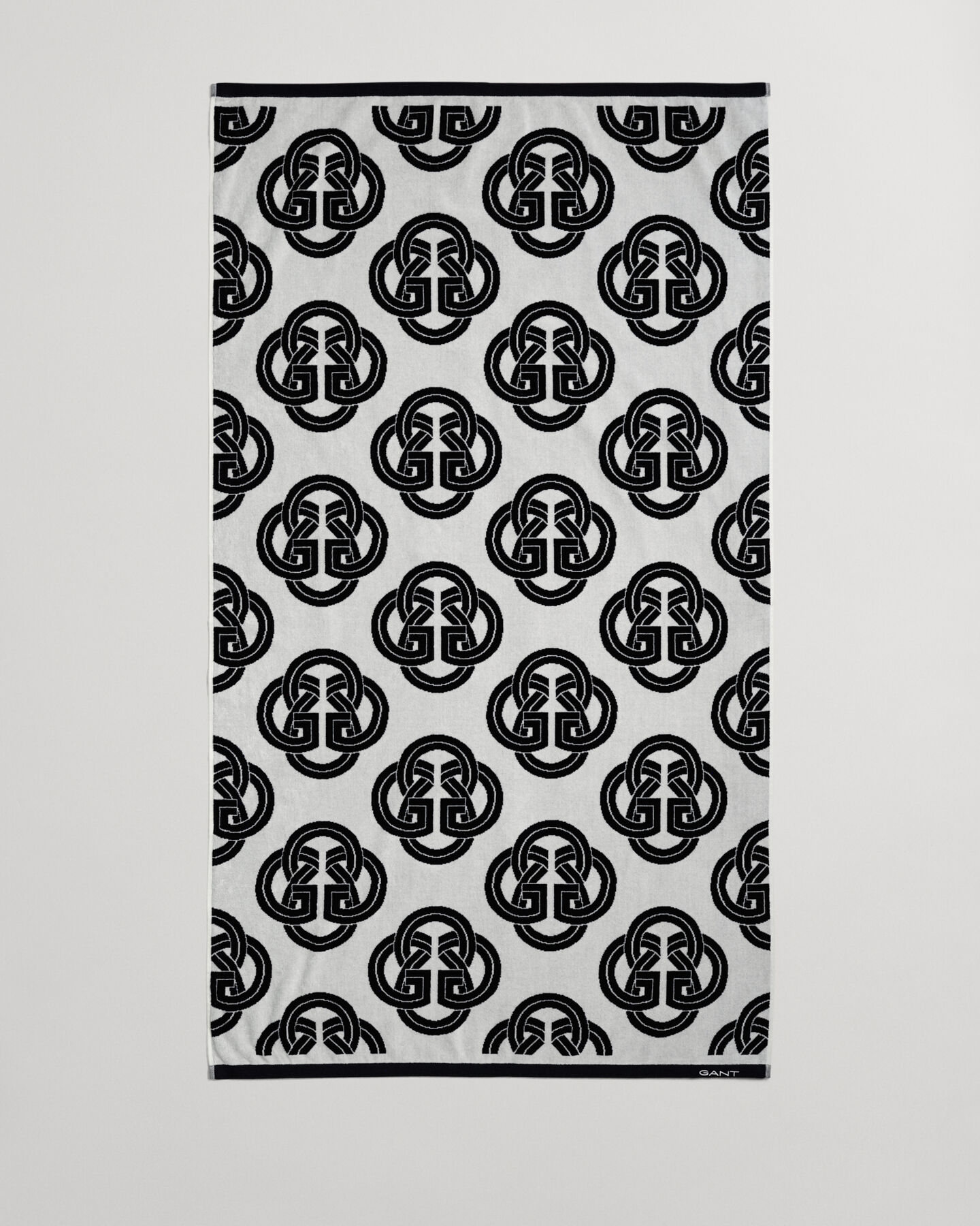 Printtikuvioitu Monogram-rantapyyhe