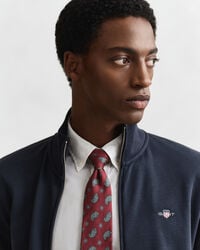 Vetoketjullinen Shield‑collegepaita