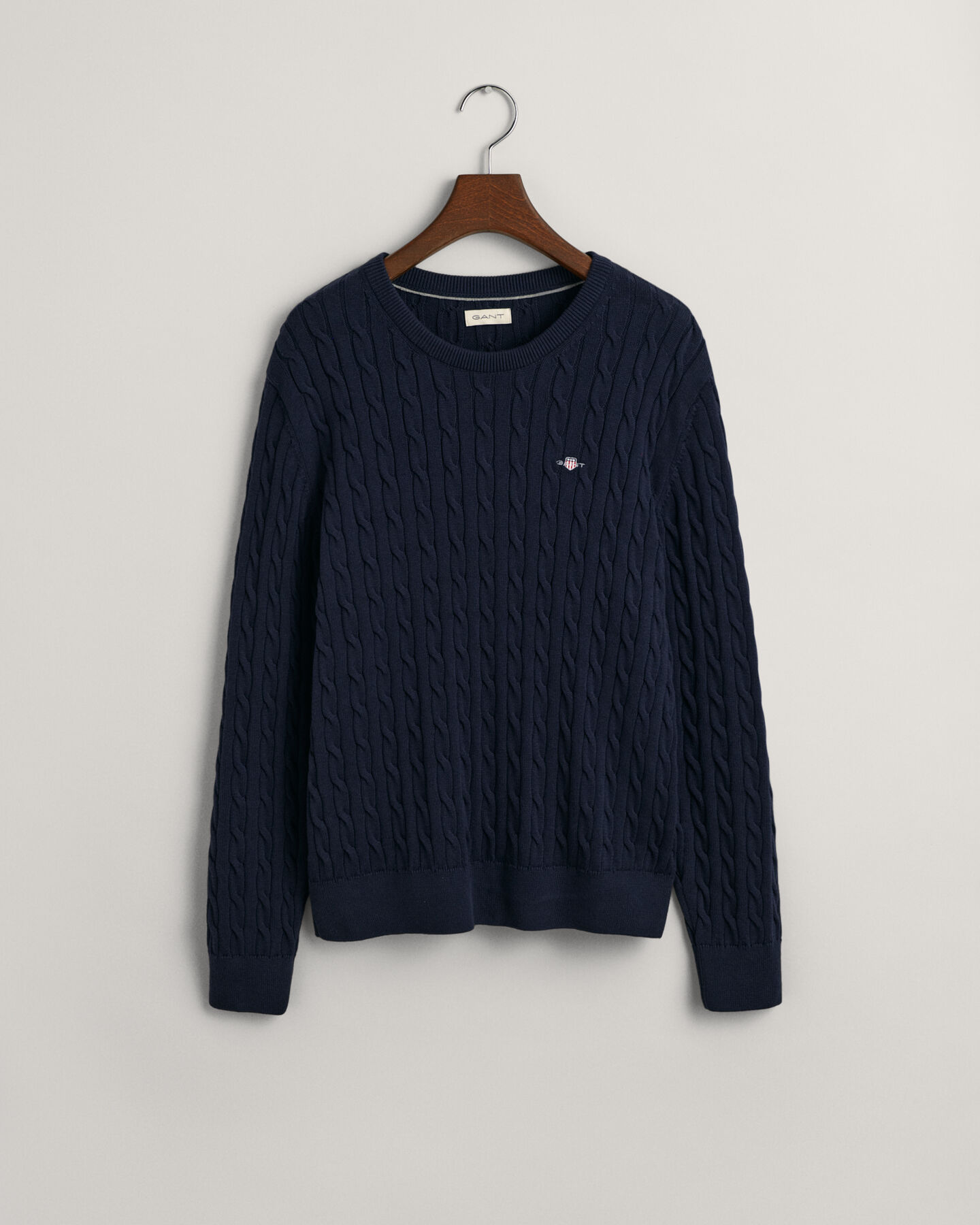 Teens-malliston puuvillainen Shield-palmikkoneulepusero, jossa pyöreä pääntie