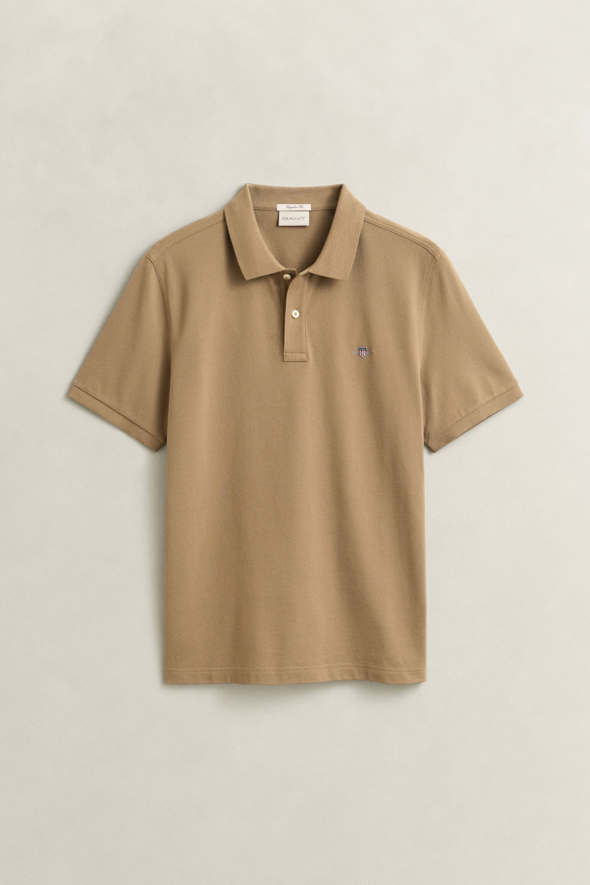 Regular fit ‑mitoitettu pikeepaita