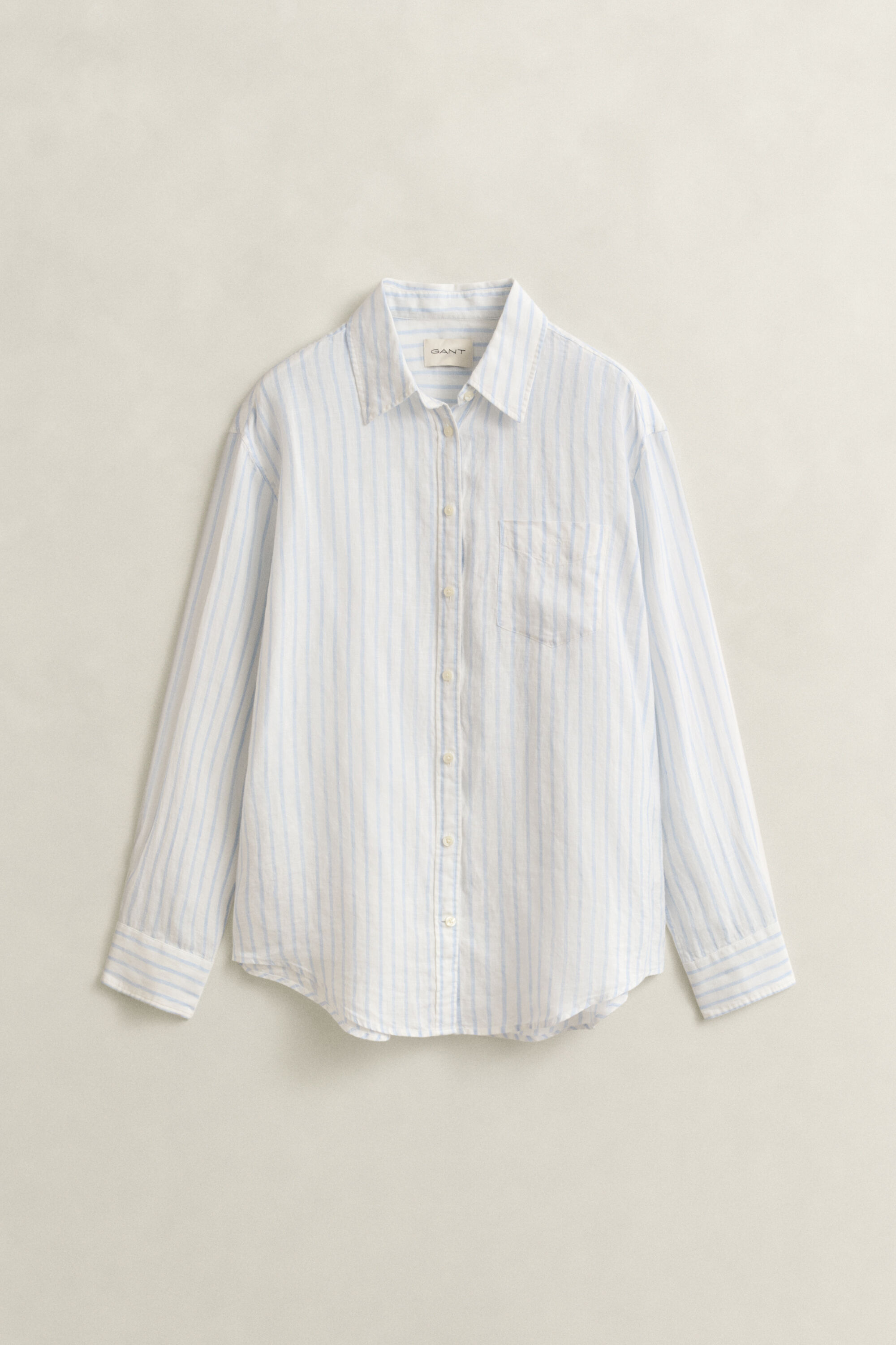 Relaxed fit ‑mitoitettu raidallinen pellavapaita