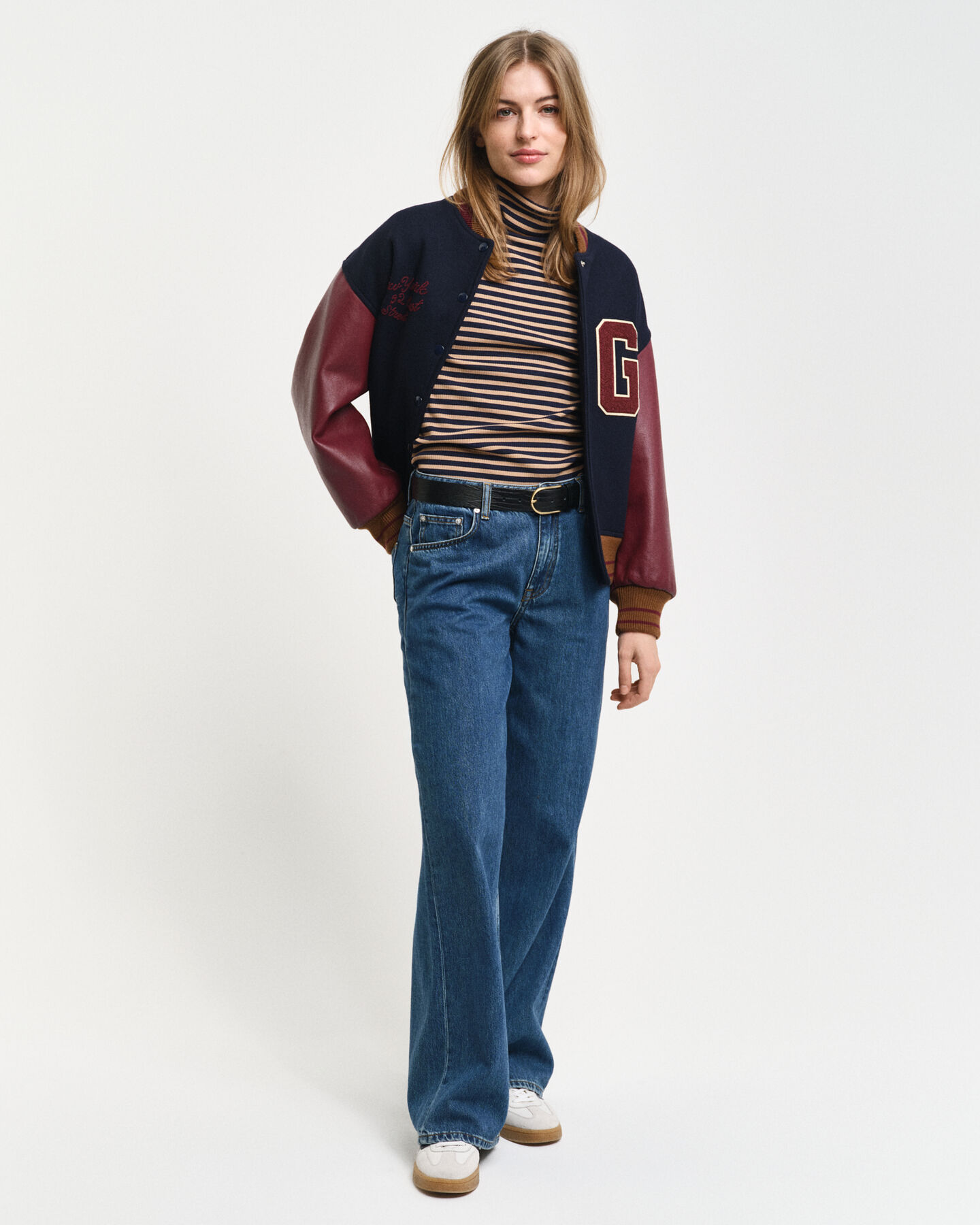 Pitkähihainen raidallinen joustinneulepoolo