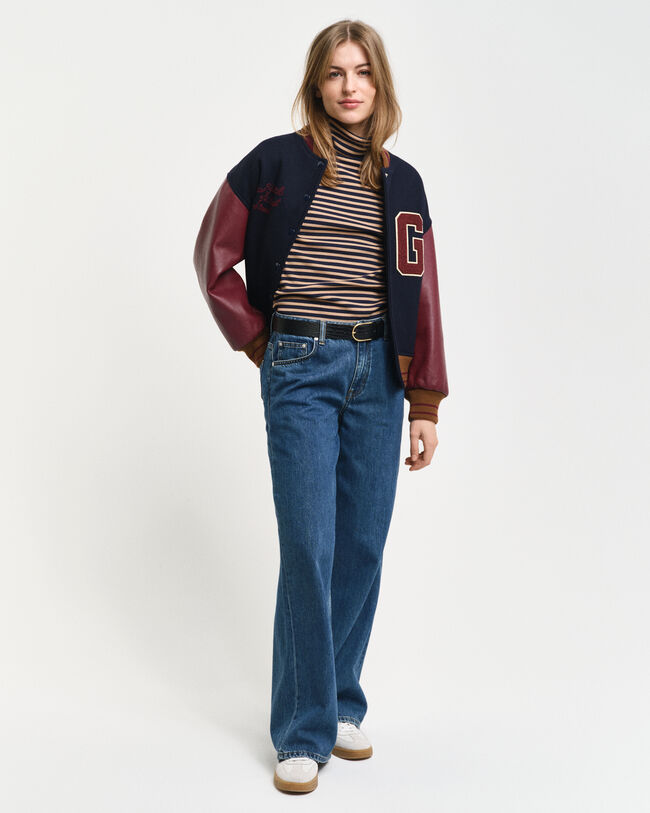 Pitkähihainen raidallinen joustinneulepoolo