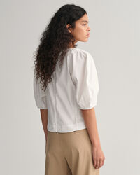 Puhvihihainen pusero, jossa v-pääntie