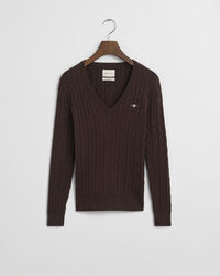 Joustava puuvillapalmikkoneule, jossa v‑pääntie