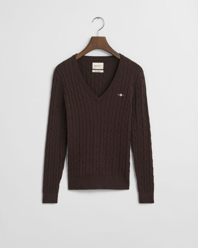 Joustava puuvillapalmikkoneule, jossa v‑pääntie