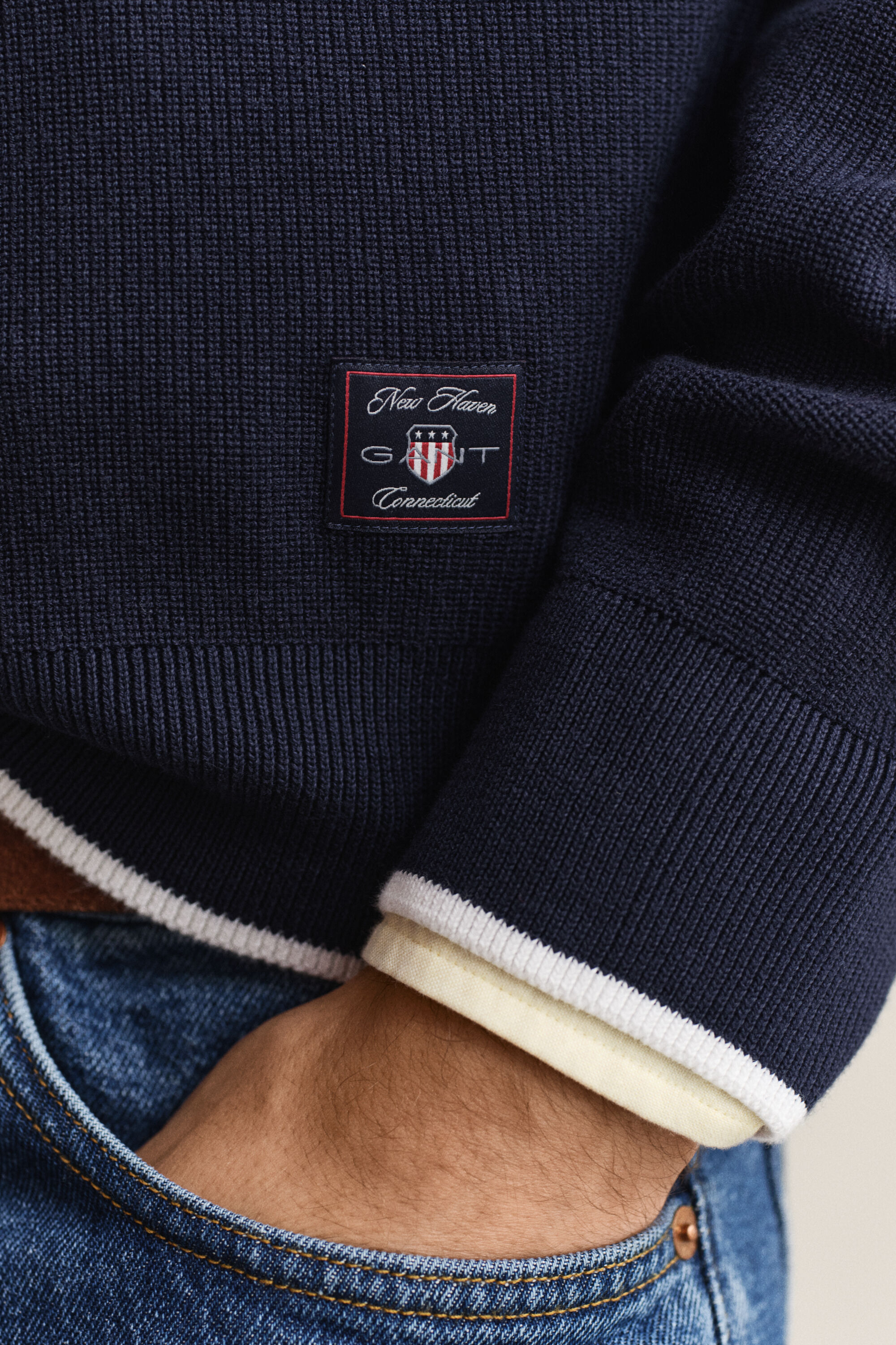 Puuvillainen vetoketjukauluksellinen ribbineulepusero